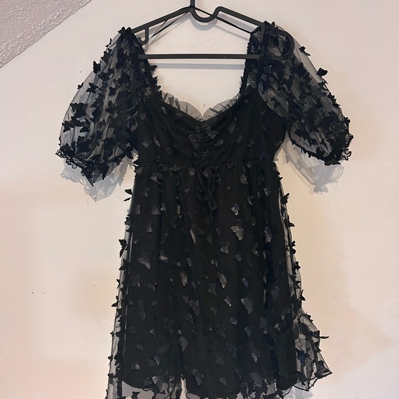 Chic Black Mini Dress with Butterfly Accents - Picture 1 of 6